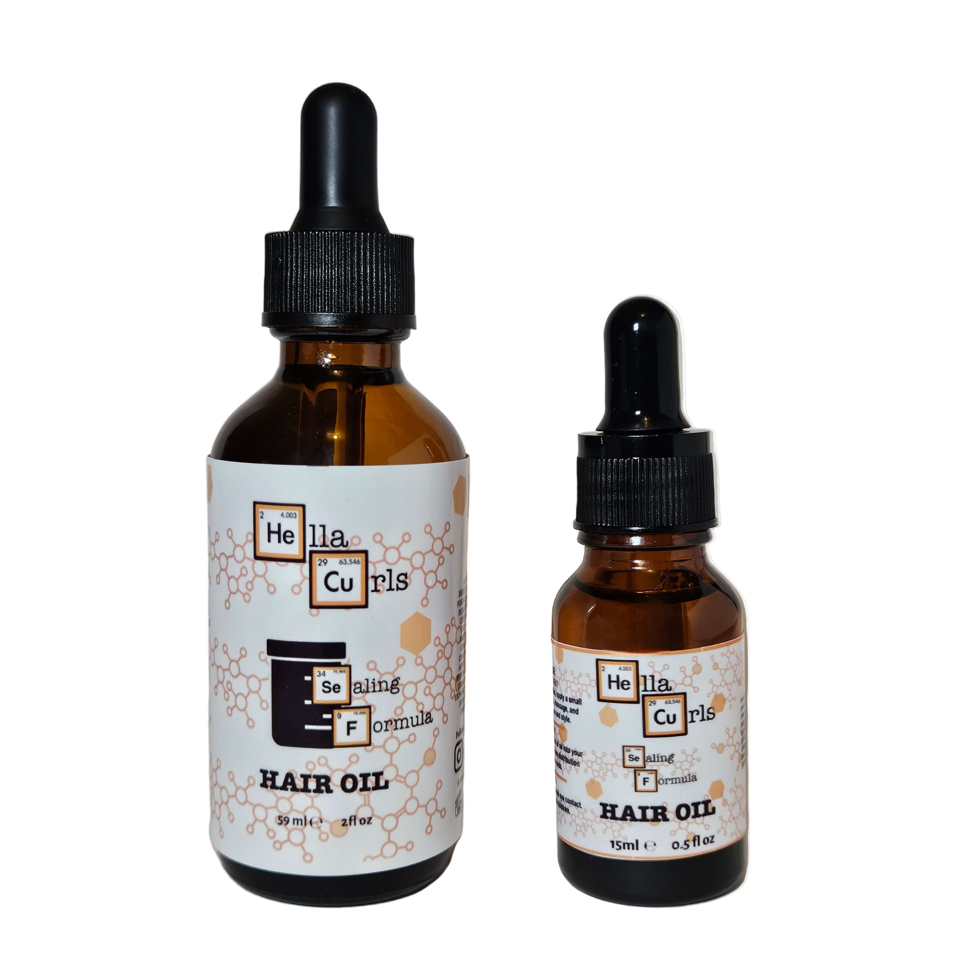 Two bottles of Hella Curls hair oil with droppers on a white background