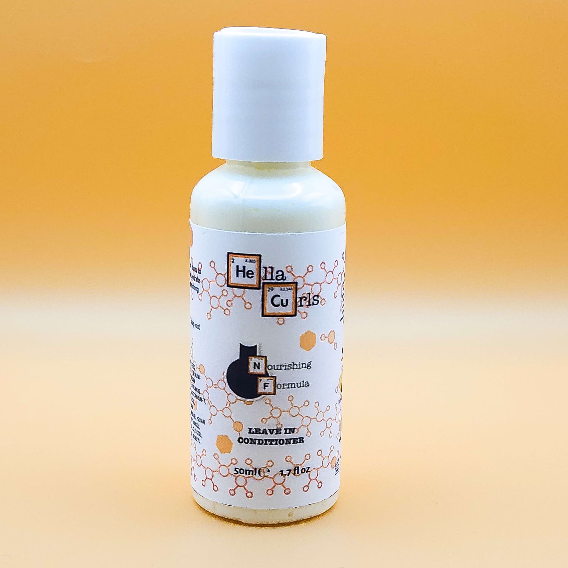 Bottle of Hella Curls leave-in conditioner on a gradient orange background
