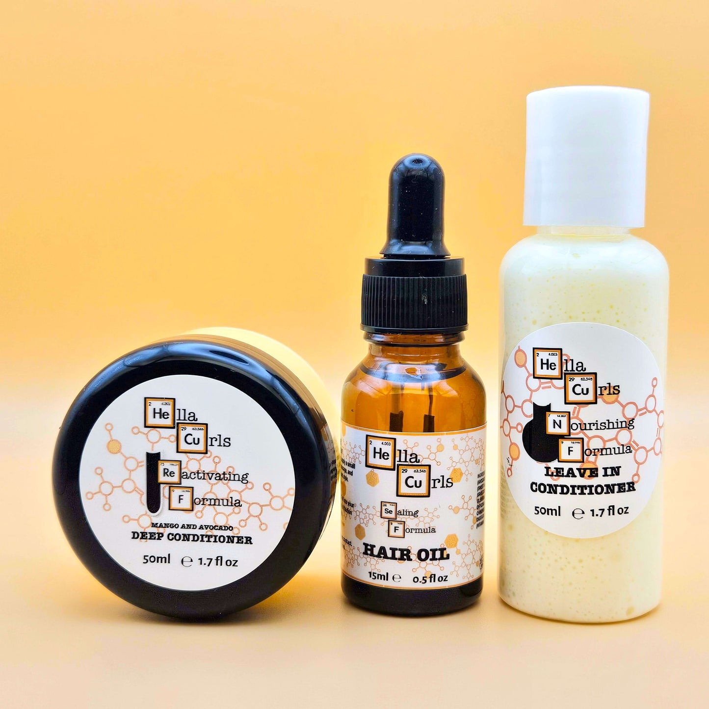 Set of Hella Curls hair care products including a jar, bottle, and dropper on a yellow background.