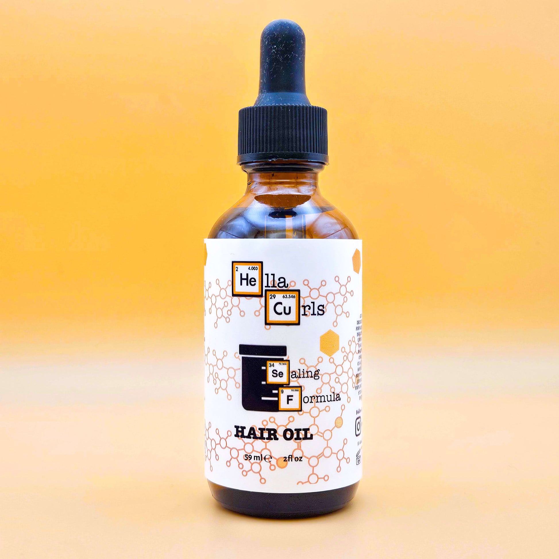 Bottle of Sealing Formula hair oil with a dropper on an orange gradient background